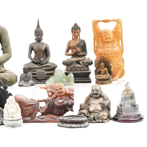 1472 - A collection of Tibetan and Chinese figures of Buddha including carved wood, brass, spelter and carv... 