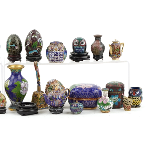 255 - A large collection of Chinese cloisonné vases, eggs, animals and trinkets, the largest 10.5cm high.