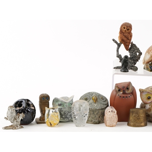 1510 - A collection of ornamental owls including pottery, carved wood, silver plated and glass examples, th... 