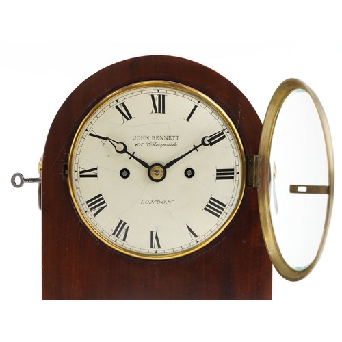  A 19th century figured mahogany mantle clock with eight day movement striking on a gong, the circula... 