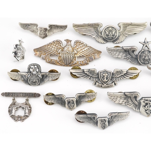 2473 - A collection of American military Air Force wing badges.