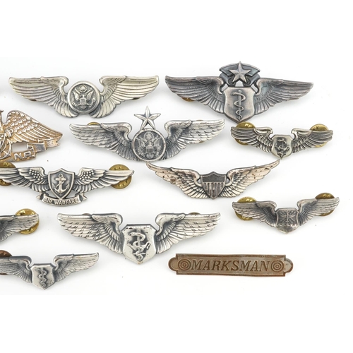 2473 - A collection of American military Air Force wing badges.