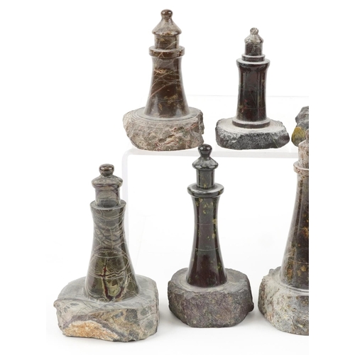 314 - Eleven carved Cornish serpentine marble lighthouses, the largest 13cm high