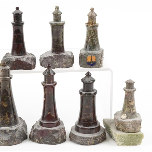 314 - Eleven carved Cornish serpentine marble lighthouses, the largest 13cm high