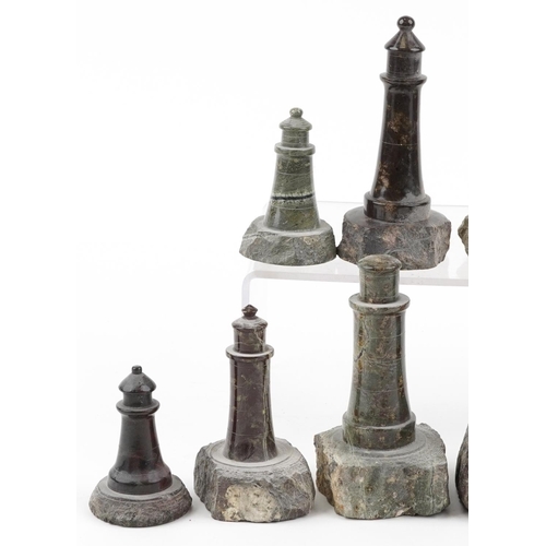 315 - Twelve carved Cornish serpentine marble lighthouses, the largest 14cm high