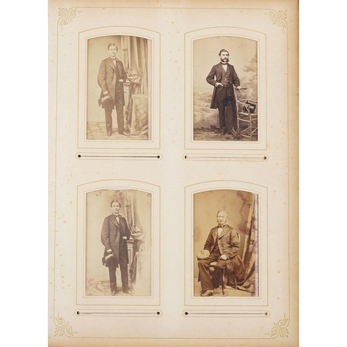 2322 - Victorian leather cabinet card album with black and white cabinet cards.