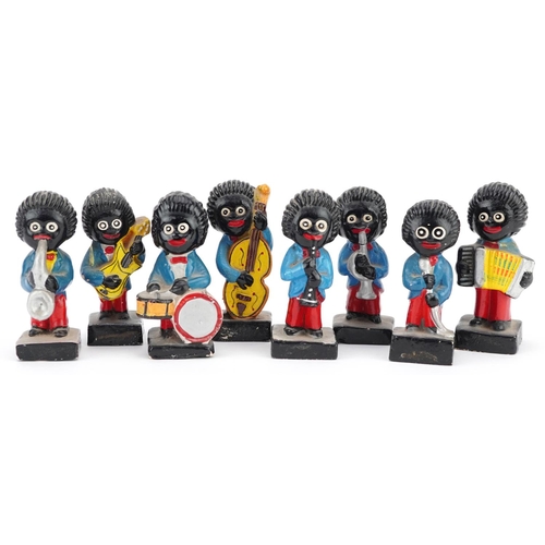 1230 - A group of eight Robertson's Golly musician figures.