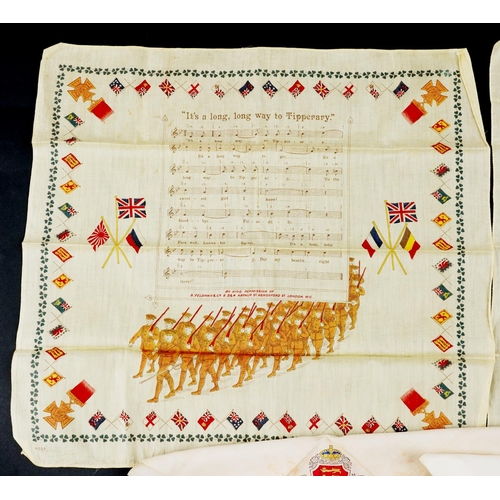 2534 - A group of four early 20th century silk embroidered and painted handkerchiefs.