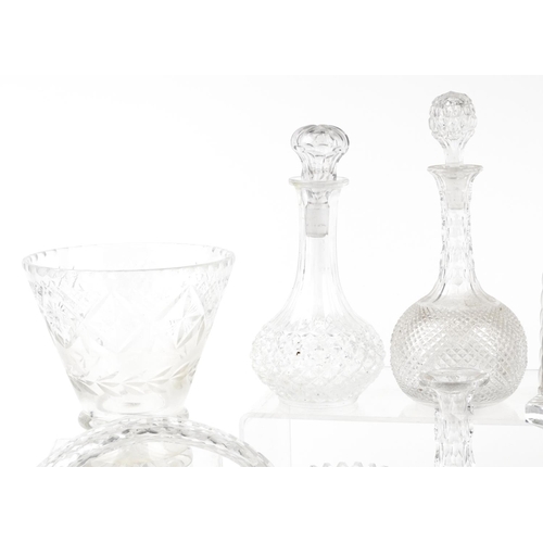 1543 - A mixed group of 20th century cut glassware including ten decanters.