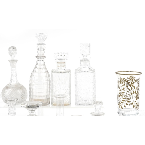 1543 - A mixed group of 20th century cut glassware including ten decanters.