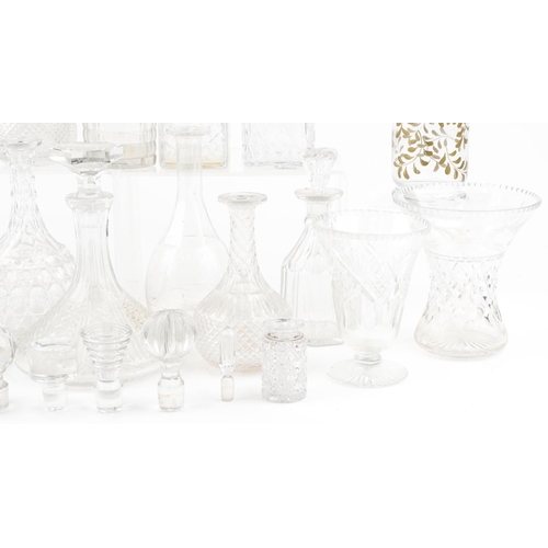 1543 - A mixed group of 20th century cut glassware including ten decanters.