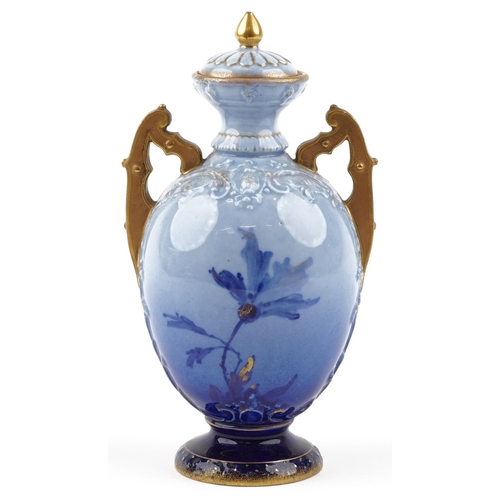 210 - A late 19th century Austrian porcelain and cover by Ernst Wahliss with gilded decoration, 24cm high.