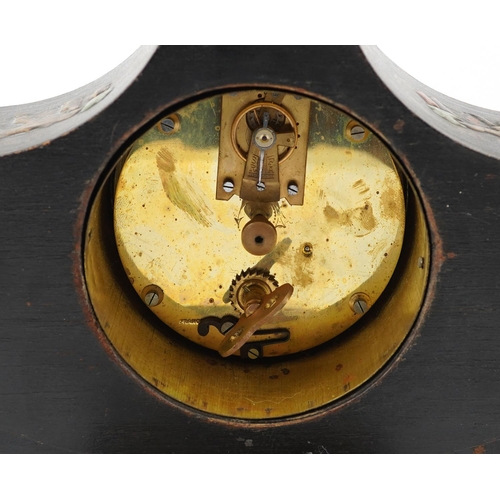 64 - An Edwardian black chinoiserie decorated mantel clock, the circular dial with black Roman numerals, ... 