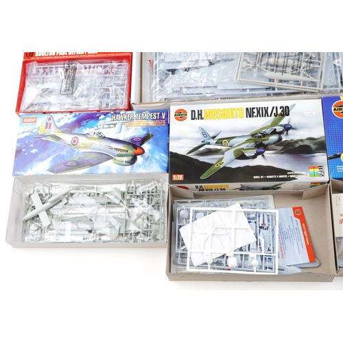 1305 - A large collection of model aeroplane kits including Airfix, Academy and Revell.