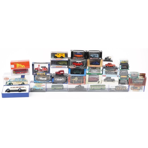 1319 - A collection of die-cast vehicles including Dinky, Oxford, Matchbox and Lledo.