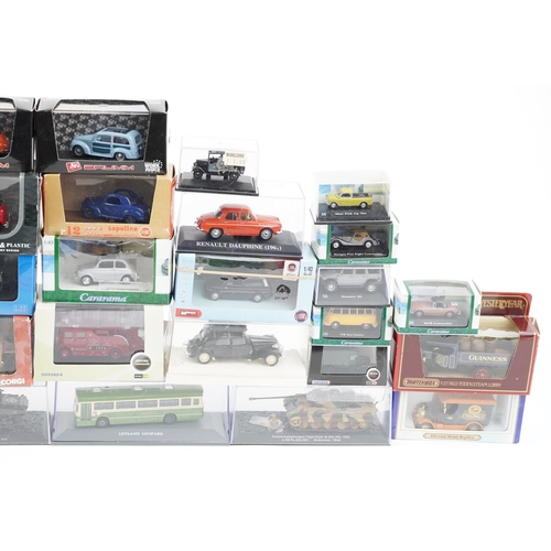 1319 - A collection of die-cast vehicles including Dinky, Oxford, Matchbox and Lledo.