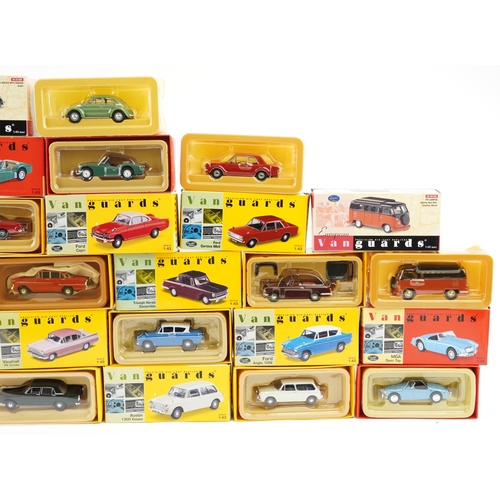 1309 - A collection of Vanguard die-cast vehicles with boxes including VW Beetle Split Screen, Ford Cortina... 