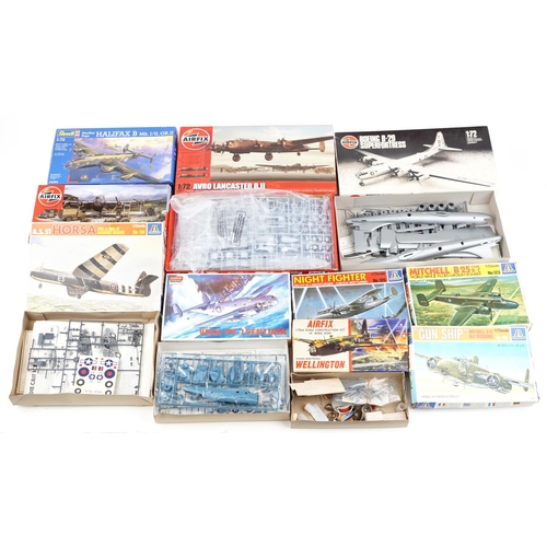 1327 - A collection of vintage model kits with boxes including Airfix and Academy.