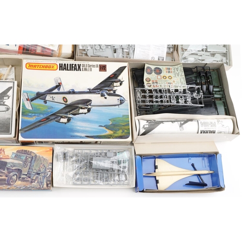 1327 - A collection of vintage model kits with boxes including Airfix and Academy.