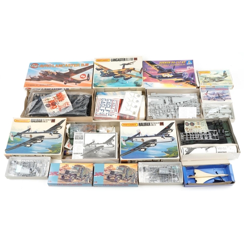 1327 - A collection of vintage model kits with boxes including Airfix and Academy.