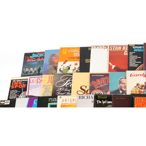 2025 - A collection of vinyl LP records to include Neil Diamond, Barry Manilow, Johnnie Mathis, The Carpent... 