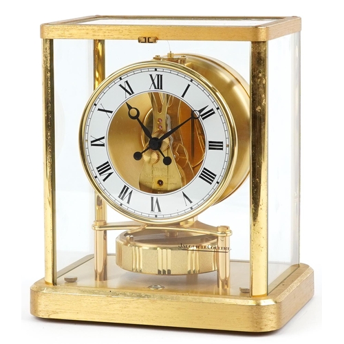 61 - A Jaeger-LeCoultre four glass Atmos clock, the circular enamelled dial with black Roman numerals, th... 