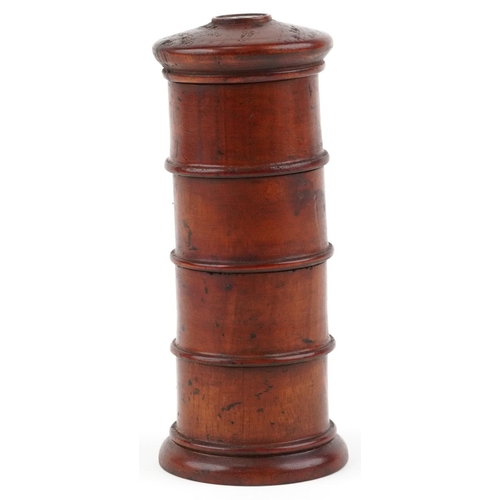 308 - A softwood four section spice holder with painted labels, 20cm high.