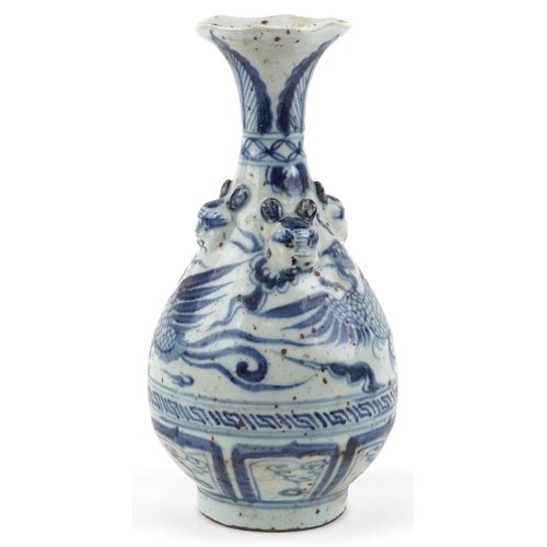 149 - A Chinese blue and white porcelain vase decorated with birds, character marks to the base, 26cm high... 