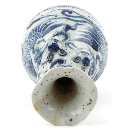 149 - A Chinese blue and white porcelain vase decorated with birds, character marks to the base, 26cm high... 