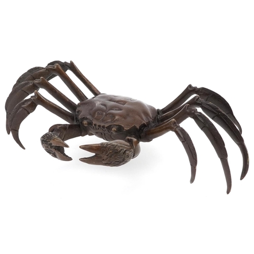 114 - A Japanese patinated bronze okimono figure of a crab, character marks to the base, 24cm wide.