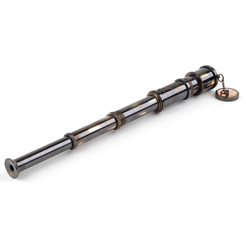 1359 - A two draw brass telescope, 31cm in length.