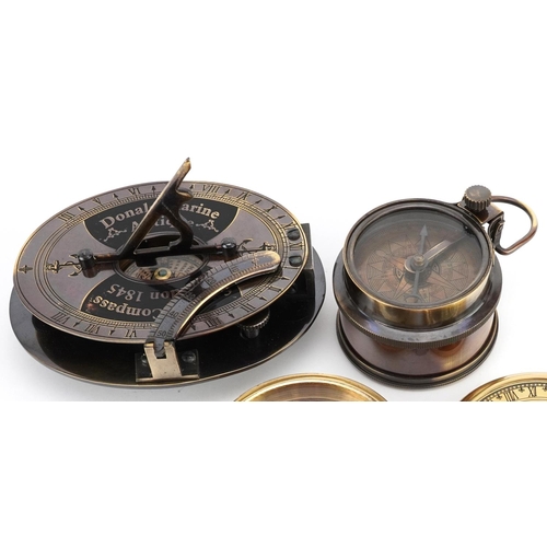 1534 - Three naval interest compasses, the largest 12cm wide.