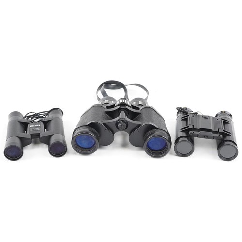 528 - A pair of Ultra View De Luxe 7x - 15 x 35 zoom binoculars together with Zeiss 10 x 25B binoculars an... 