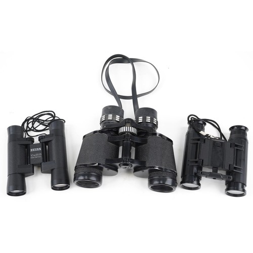 528 - A pair of Ultra View De Luxe 7x - 15 x 35 zoom binoculars together with Zeiss 10 x 25B binoculars an... 