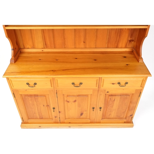 1135 - A late 20th century pitch pine dresser, 192cm H x 137cm W x 44cm D.