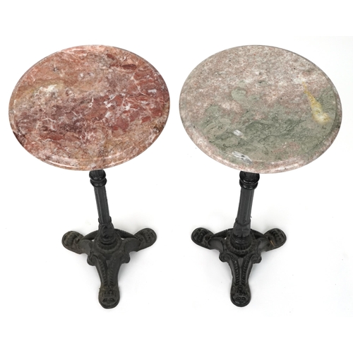 1104 - A near pair of 20th century marble and cast iron Martini tables, one with a rouge marble top, the ot... 