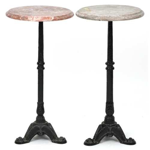 1104 - A near pair of 20th century marble and cast iron Martini tables, one with a rouge marble top, the ot... 