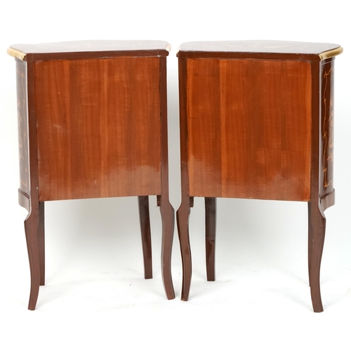 1054 - A pair of Louis XV style mahogany and gilt metal mounted bedside chests of four drawers, 76cm H x 49... 