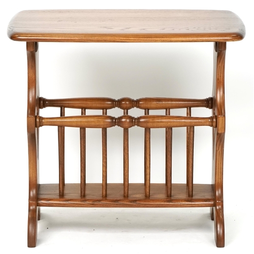 1030 - A late 20th century Ercol stained beech magazine rack, 49cm H x 53cm W x 35cm D.