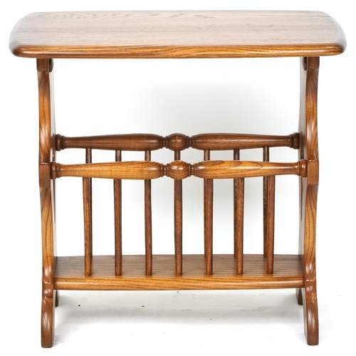 1030 - A late 20th century Ercol stained beech magazine rack, 49cm H x 53cm W x 35cm D.