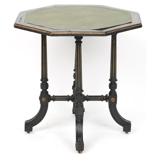 1119 - A late Victorian ebonised and boxwood inlaid octagonal centre table, raised on fluted supports, 60cm... 