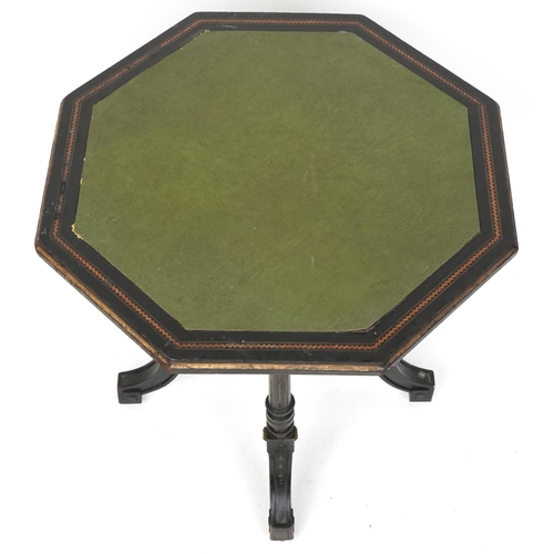 1119 - A late Victorian ebonised and boxwood inlaid octagonal centre table, raised on fluted supports, 60cm... 