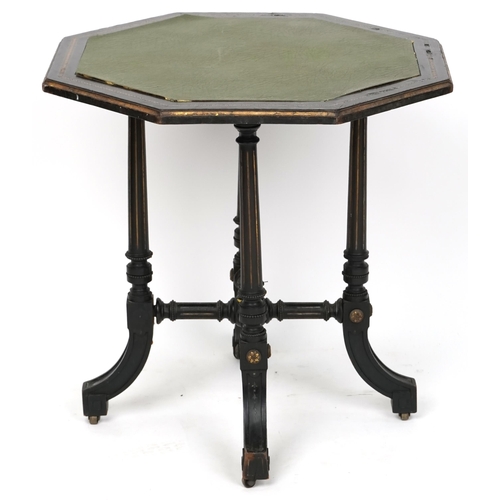 1119 - A late Victorian ebonised and boxwood inlaid octagonal centre table, raised on fluted supports, 60cm... 