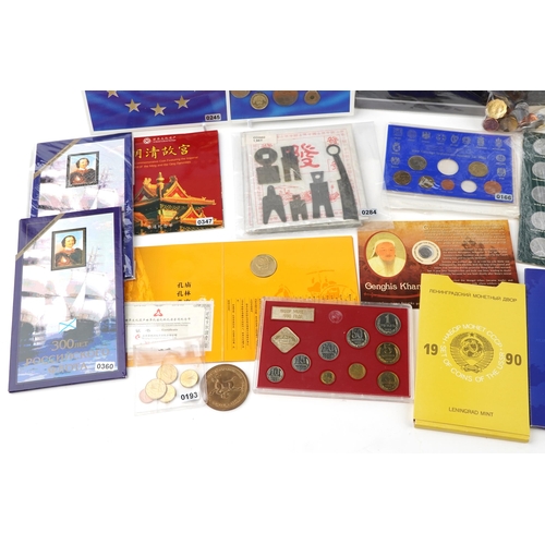 2184 - A quantity of world coins and medals in packs to include two Rugby World Cup 2003 five dollar uncirc... 