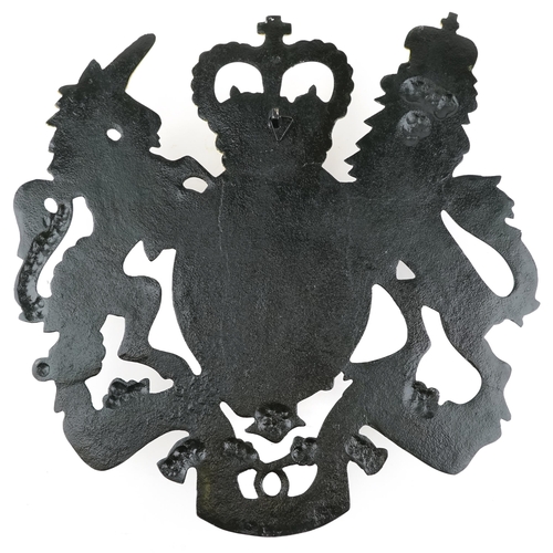 1395 - A wrought iron United Kingdom royal heraldic crest wall plaque, 50cm high.