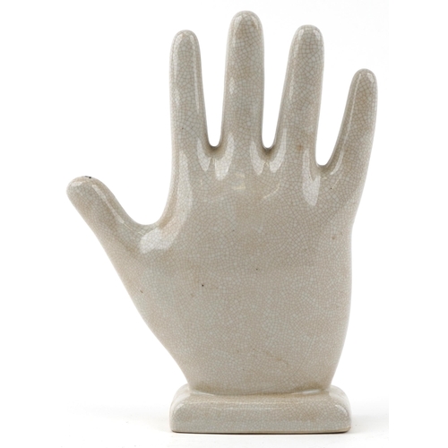 1424 - A large ceramic palmistry hand decorated with zodiac signs, 31cm high.