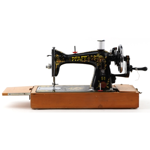 1469 - A vintage Pfaff sewing machine with fitted box and paperwork, 51cm wide.