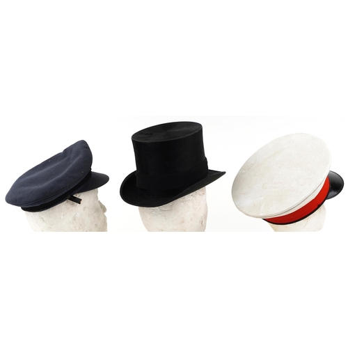 537 - Two military interest visor caps together with a gentlemen's top hat made by G. A Dunn & Co LD. Hat ... 