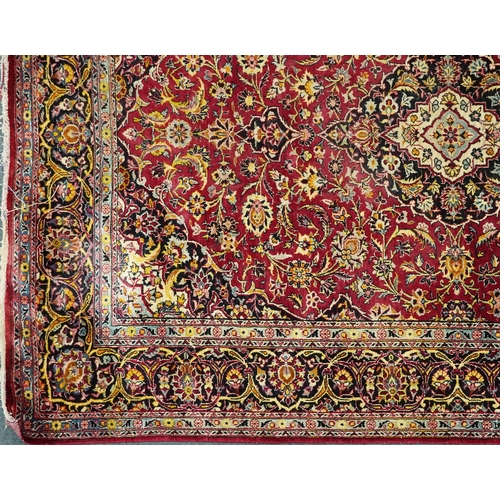 1032 - A Kashaan silk rug, 20th century, the midnight blue field with a central stylized medallion flanked ... 