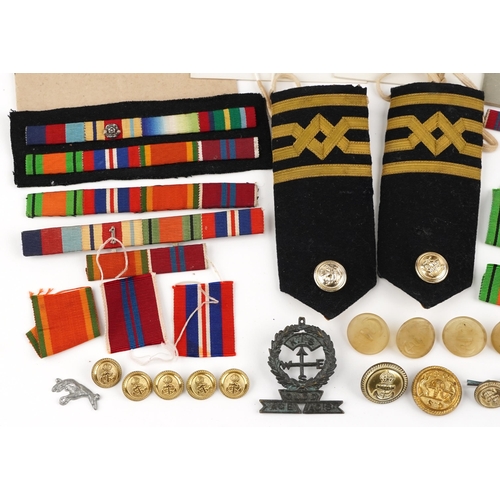 2476 - A collection of naval militaria relating to Lieutenant Commander Derek George Green of The Royal Eas... 